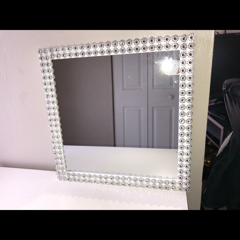 Silver Decor and White Mirror